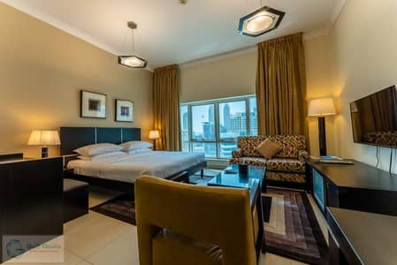 شقة فندقية  للايجار في برشا هايتس (تيكوم)، دبي - BED ROOM