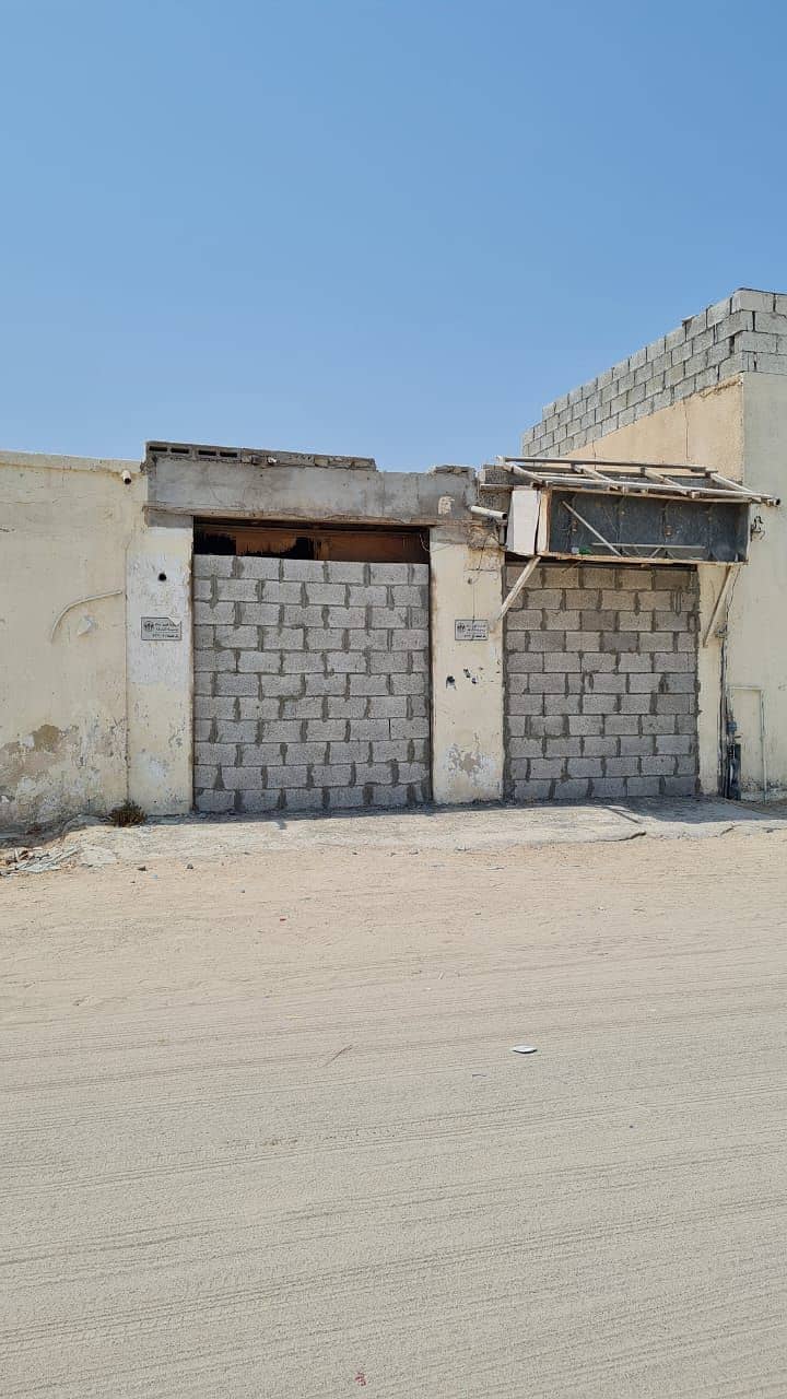For sale an old house for demolition in Sharjah Qadisiyah . .