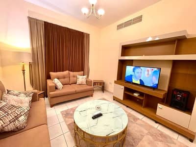 2 Bedroom Apartment for Rent in Al Majaz, Sharjah - Sharjah, Al Qasba, the first inhabitant, two rooms, a hall, a large area, a kitchen with all purposes, and two bathrooms. The price is 6300 dirhams