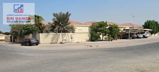 A complex of villas for sale in Umm Al Quwain, Al Rawda area