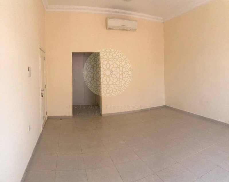 12 SWEET AND BRIGHT 4 BEDROOM COMPOUND VILLA WITH MAJLIS AND MAID ROOM FOR RENT IN KHALIFA CITY A