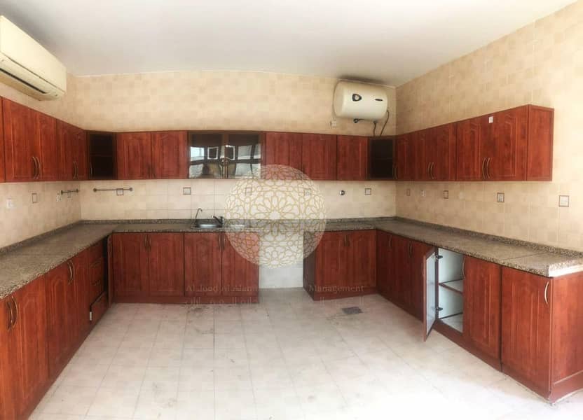 26 STUNNING SEMI INDEPENDENT VILLA WITH DRIVER ROOM ANS KITCHEN OUTSIDE FOR RENT IN KHALIFA CITY A