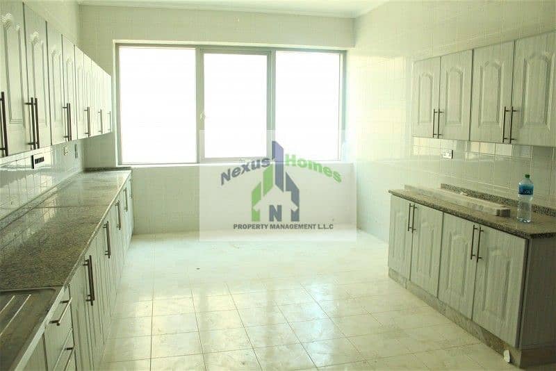 4 4 BR Super Spacious Apartment with Maids Room For Rent