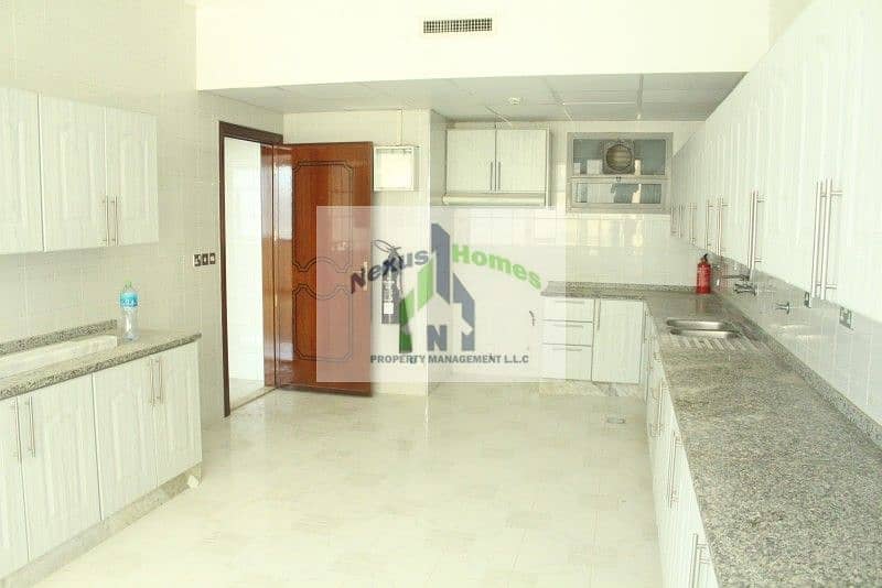5 4 BR Super Spacious Apartment with Maids Room For Rent