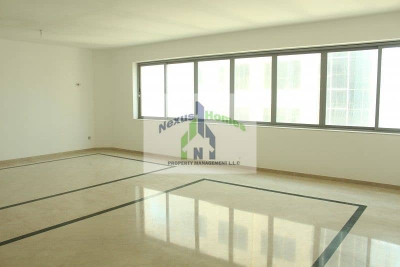 10 4 BR Super Spacious Apartment with Maids Room For Rent