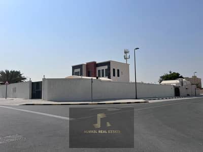 corner Villa for sale in the Emirate of Sharjah, Talaa area      New villa first inhabitant     main street