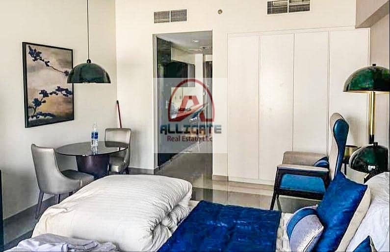 7 | LUXURY, POOL VIEW FULLY FURNISHED STUDIO FOR RENT IN DAMAC MAJESTINE BUILDING |