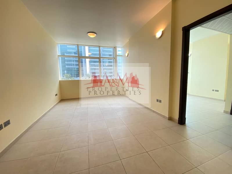 HOT DEAL. : One Bedroom Apartment With Basement Parking for  AED  45,000 Only. !!