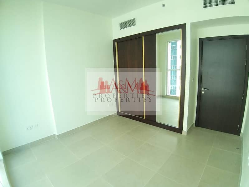 4 BRAND NEW. : Two Bedroom Apartment with Basement parking at Khalifa Street for AED 60