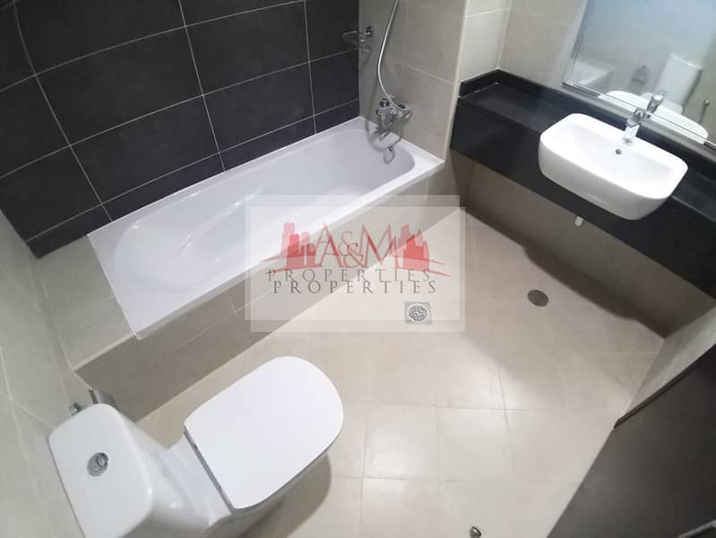 12 BRAND NEW. : Two Bedroom Apartment with Basement parking at Khalifa Street for AED 60