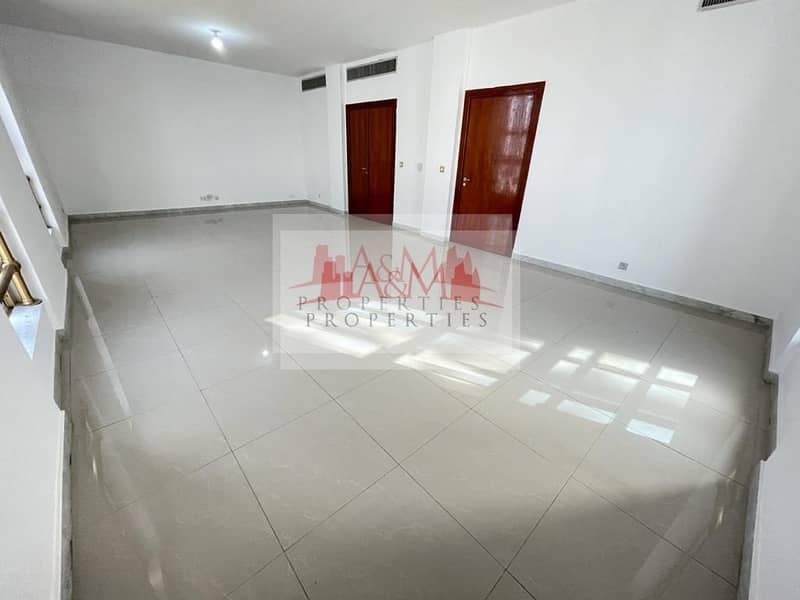 SPACIOUS. : Three Bedroom Apartment with Maids room & Balcony for AED 85,000 Only. !!
