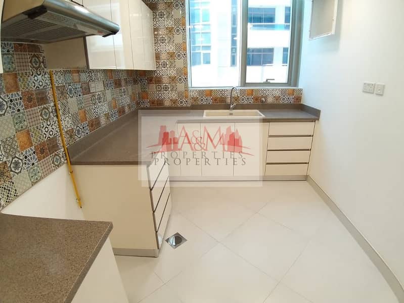 14 ONE MONTH FREE. : Two Bedroom Apartment with Store room & Facilities for AED 75