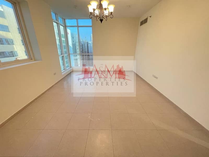 HOT OFFER. : Two Bedroom Apartment with Gym & Basement Parking for AED 65,000 Only. !!