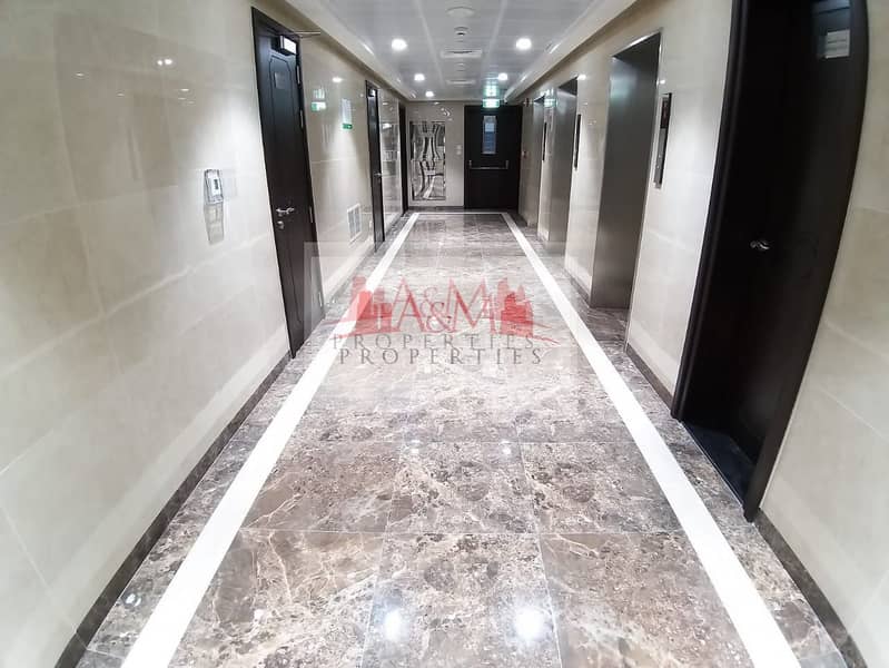 BRAND NEW. : Two Bedroom Apartment with Basement Parking  for AED 60,000 Only. !!!