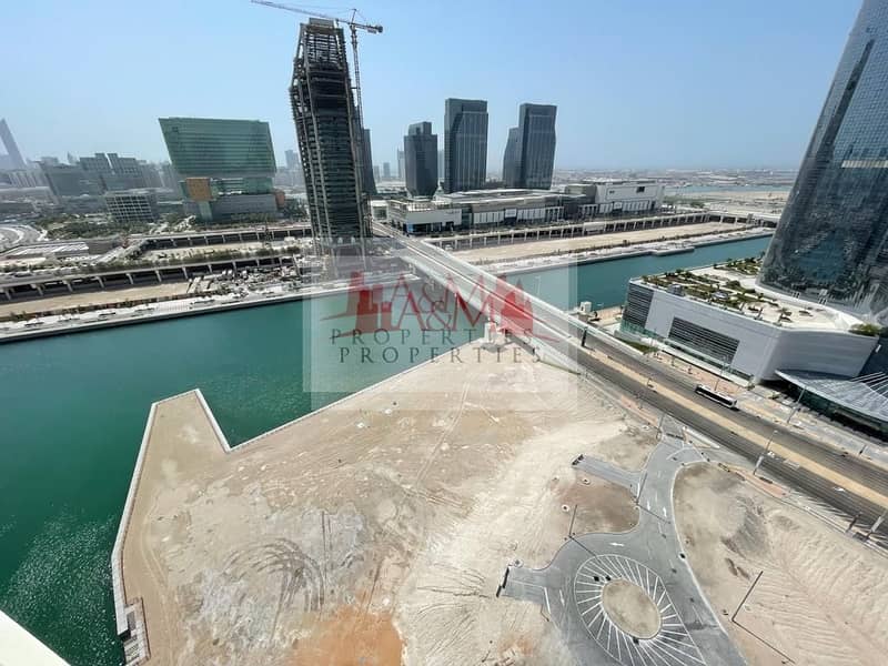 CANAL VIEW. : One Bedroom Apartment with Balcony & all Facilities for AED 58,000 Only. !!
