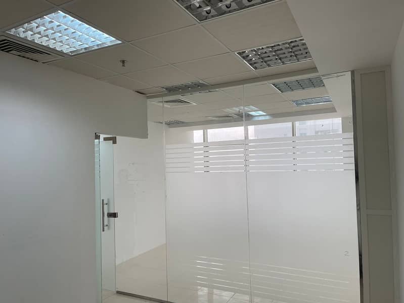 AVAIL GLASS DECORATIVE PARTITION OFFICE WITH (FREE A. C, SEWAGE AND ELECTRICITY WATER