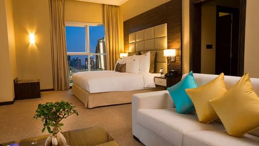 Hotel Apartment for Rent in Tourist Club Area (TCA), Abu Dhabi - No COMMISION-Deluxe Suite
