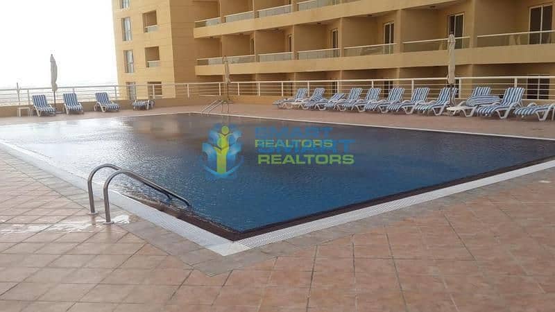 9 Furnished Studio with Parking 4 Cheqs Pool View IMPZ Dubai