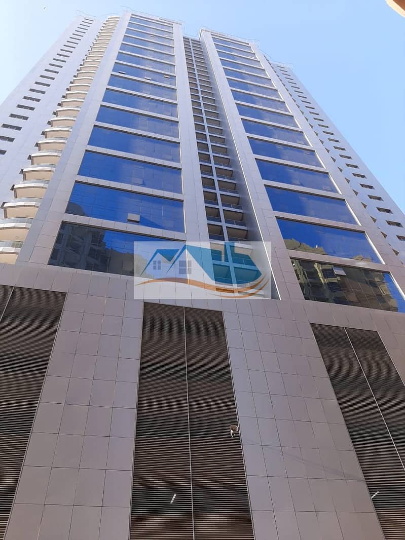 For rent in Ajman and those who want air conditioning for the owner, luxurious spaces and views of the creek, a new tower, the first inhabitant on El Mina Street in Rashidiya, apartment 3 room room, maid room lounge, washing room with car park inside the