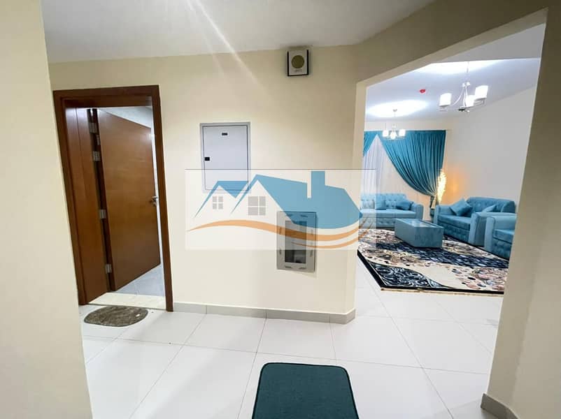 For rent in Ajman, an apartment, a room and a hall with a balcony, with 2 bathrooms, the first inhabitant, furnished, new furniture, in New Balyawara,