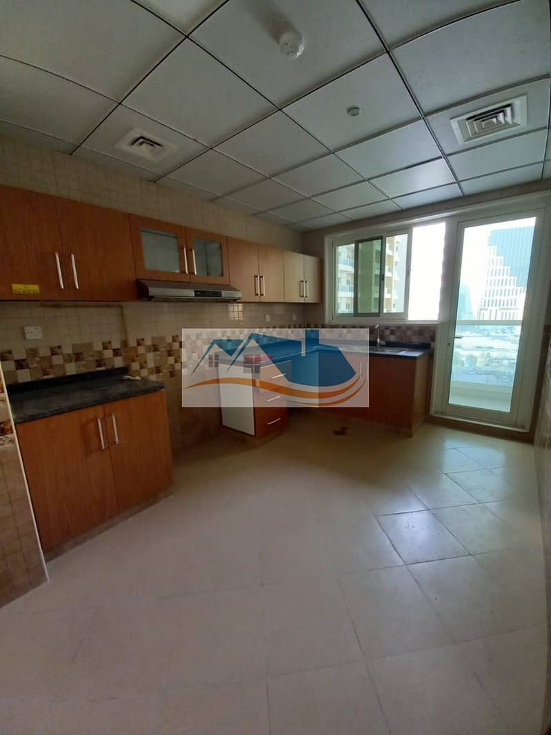 For annual rent in Ajman, an apartment of two rooms and a hall, the first inhabitant of the sunset towers, free air conditioning for the owner, with a