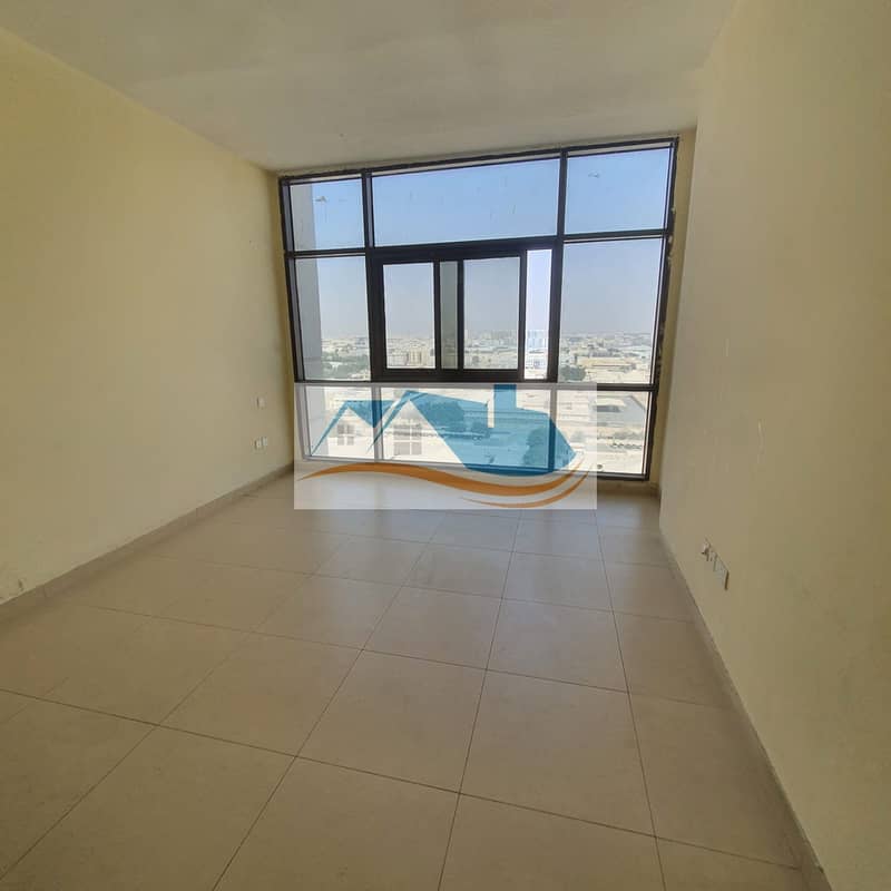 For annual rent in Ajman a room and a hall in Jasmine Towers, close to Carrefour City Center, with two free months