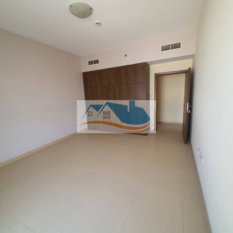 For annual rent in Ajman, a three-bedroom apartment and a hall in Jasmine Towers, close to Carrefour City Center, with two free months