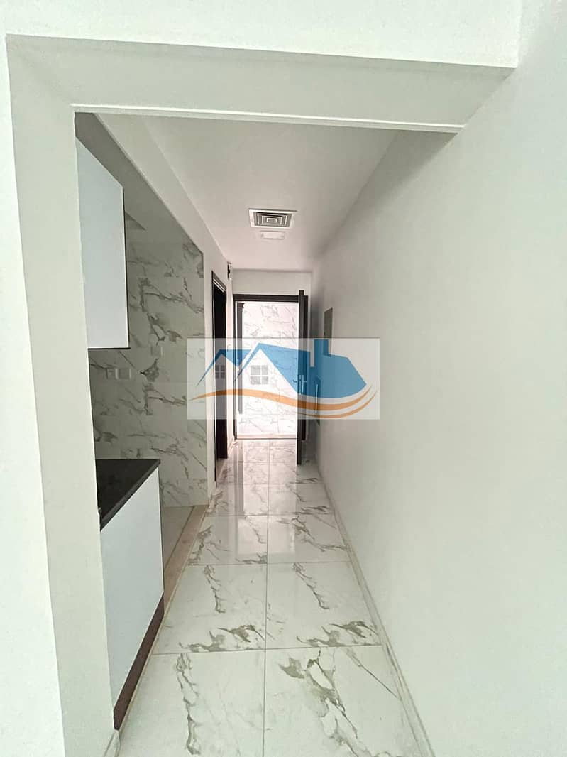 For rent in Ajman studio separate kitchen with balcony in Al Rashidiya area close to ladies park