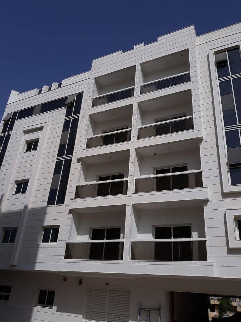 for sale, a new building in Al Nuaimiya area . . corner of two Qar streets