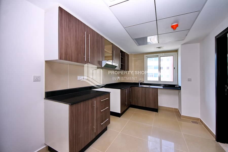 9 3 bedroom-apartment-abu-dhabi-al-reef-downtown-kitchen. JPG