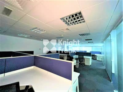 Office for Rent in Jumeirah Lake Towers (JLT), Dubai - Low-Floor Office with Partitions and Meadows View