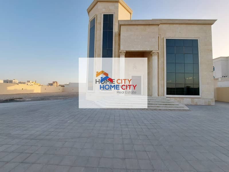 Villa for rent in the city of Al Shamkha, a great location behind Bin Yas Club, 6 master rooms, 230000 dirhams