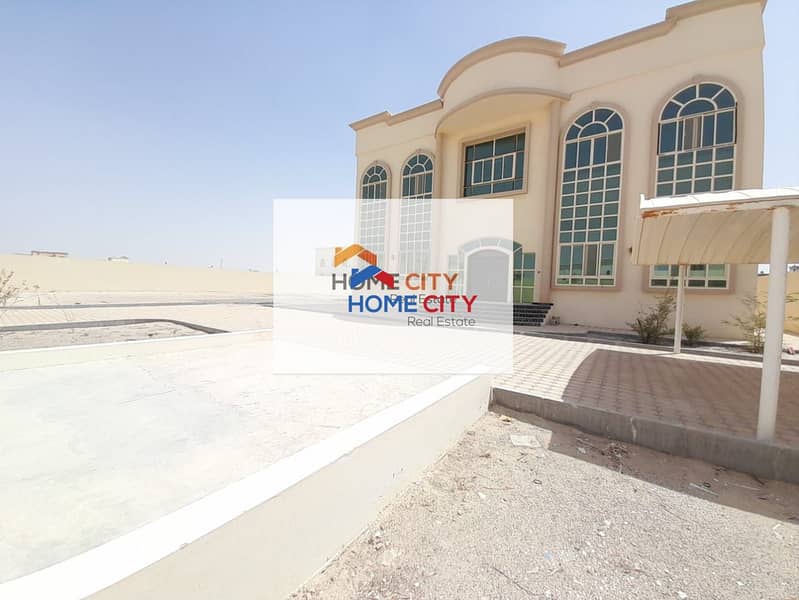 Villa for rent in Al Shamkha, a great location behind Bin Yas Club, 8 master rooms, 160000 dirhams