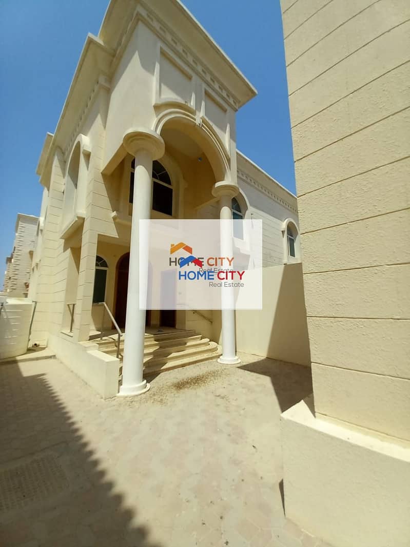 Villa for rent in Shakhbout City, in a great location, next to all services, 4 master rooms, 130000 dirhams
