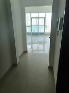 Two bedroom apartment  and hall  for sale, Palm Tower 3, Al Qasba, with good sea view of the canal and Al Mamzar