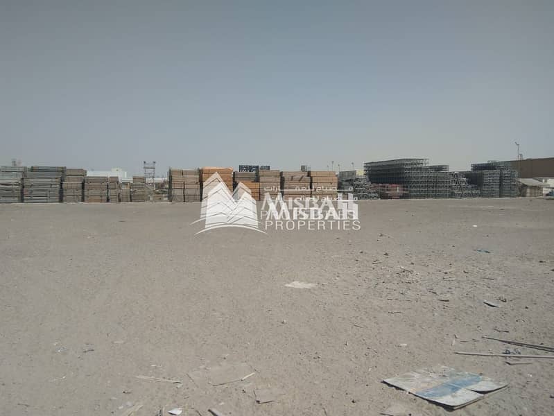 BIG COMMERCIAL OPEN LAND FOR  GARAGE/ STORAGE USE- WITH WAREHOUSE, DEWA , OFFICE