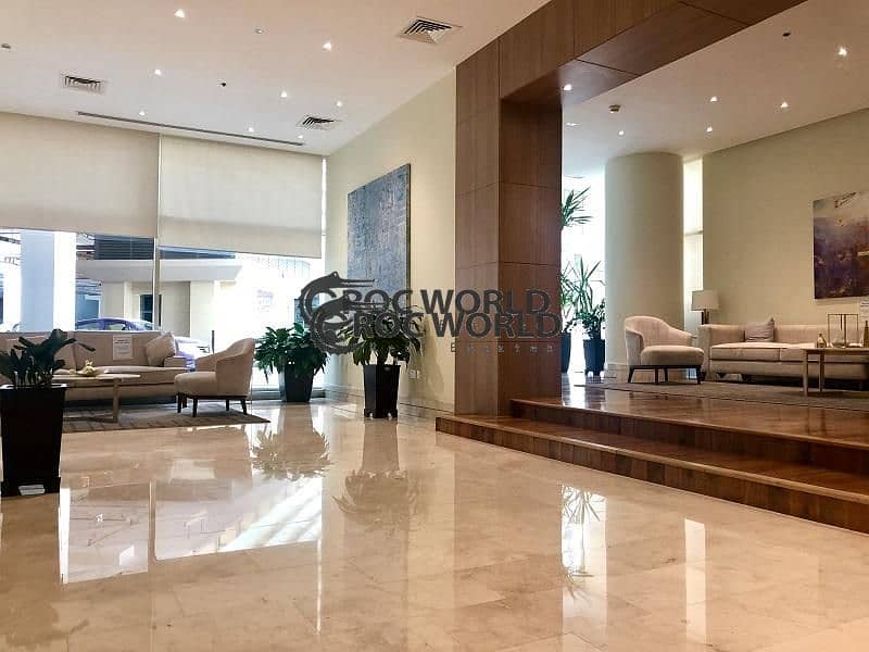 2 Chiller Free | Partially Furnished 1BR + Laundry | Marina View | Close to Dubai Tram