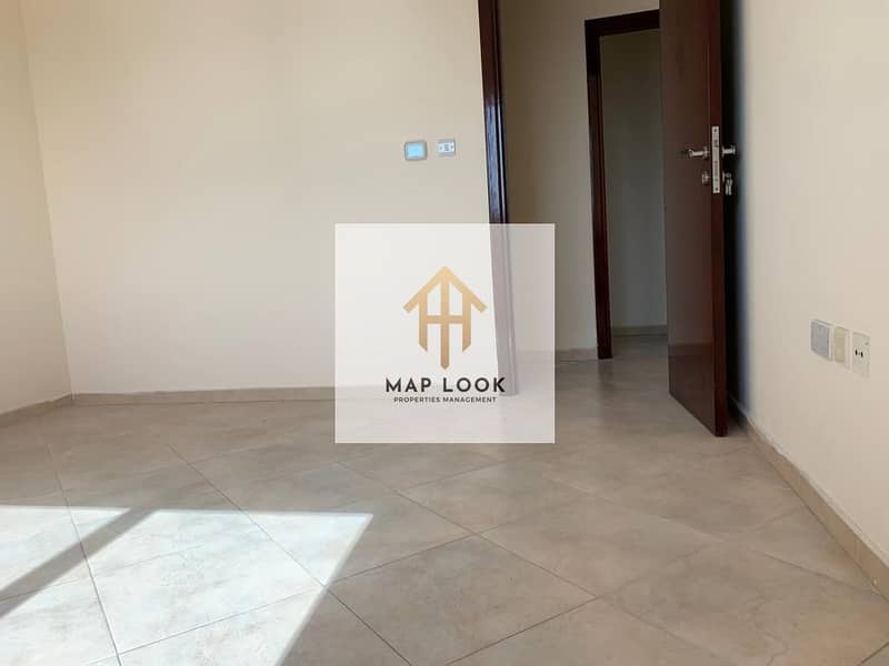 offer !! 2 bedroom 2 bathrooms centralized a/c 50000/- located al nahyan defence road