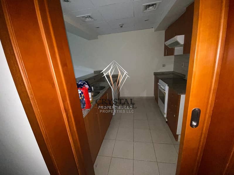 9 Upgraded wooden floors 1 BR With Park  View +Balcony in Al Dhafrah 1 Green