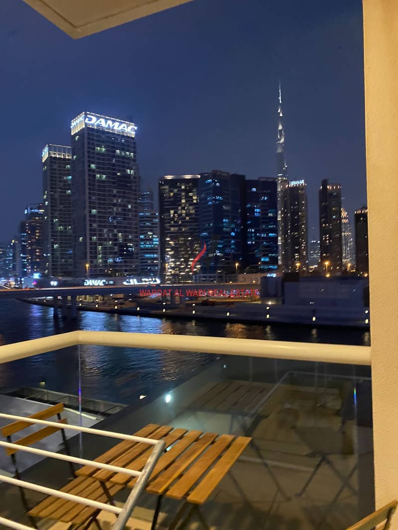 ONE BHK APARTMENT FOR SALE | UNFURNISHED | PARTIAL BURJ KHALIFA VIEW | CANAL VIEW