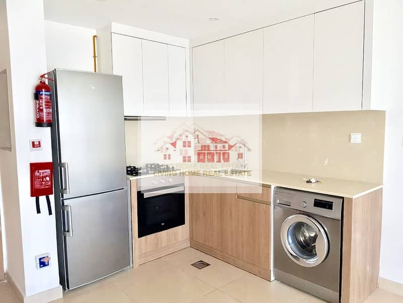 7 STUDIO WITH KITCHEN APPLIANCES IN AURION RESIDENCE JVC
