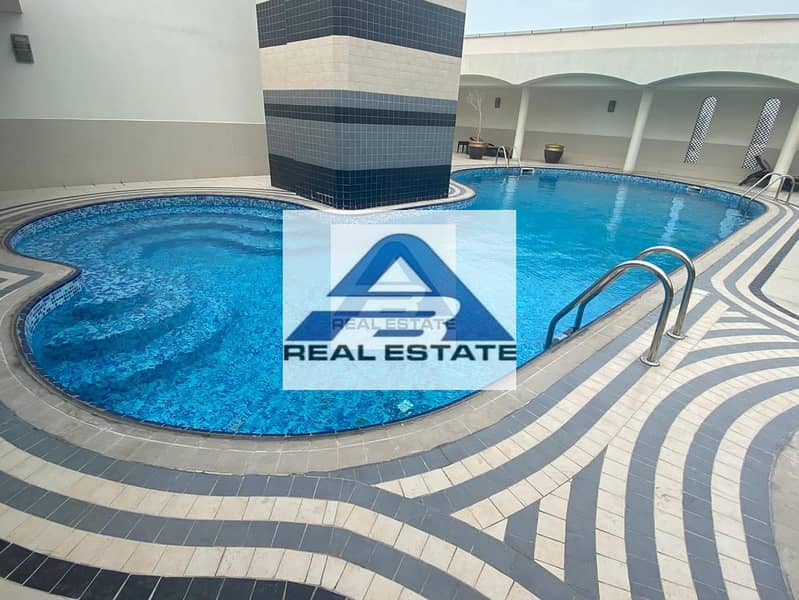 Two beds with Pool & Gym near Wahda Mall