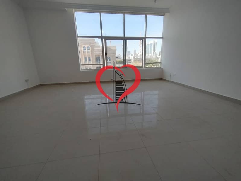 Huge studio appointment available for rent with parking opposite wahda mall:
