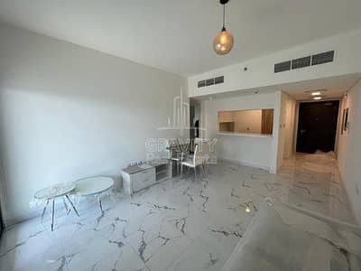 2 Bedroom Flat for Rent in Al Raha Beach, Abu Dhabi - hallway-with-2-seater-couch-dining-table-and-nice-ambience-lighting-in-apartment-al-raha-lofts-2. jpg