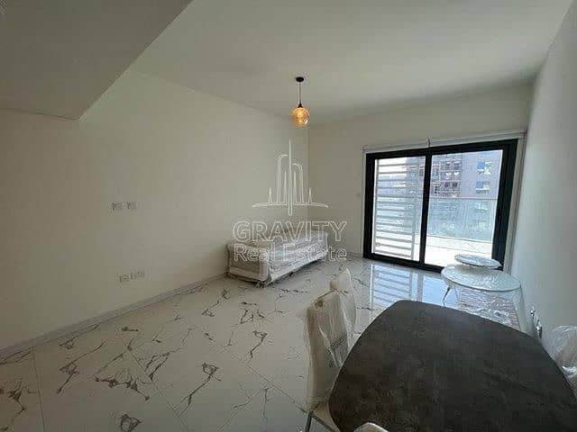 2 spacious-living-hall-area-with-marble-tiling-in-2-bedroom-apartment-in-al-raha-lofts-2. jpg