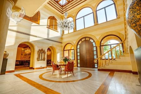 5 Bedroom Villa for Sale in Emirates Hills, Dubai - Lake View Mansion|Triple Height Entrance|Basement