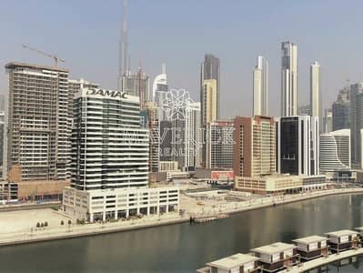 Exclusive 1BR | Canal + Burj View |  Rented