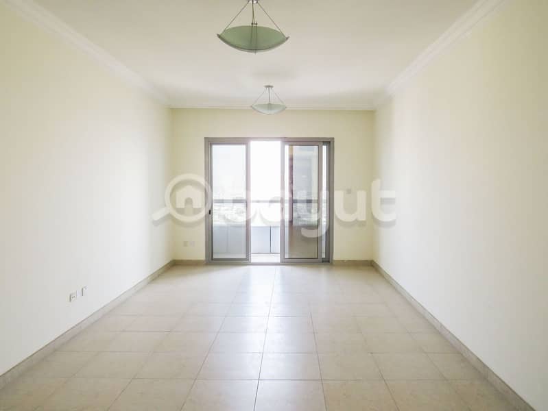 Easy Access to Dubai| Spacious 2BR Flat for Rent in Style Tower