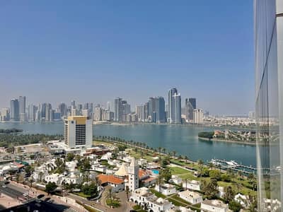 Office for Rent in Al Majaz, Sharjah - Office ,Business tower, View of Buhaira Corniche ,A/C FREE ,1 Month Free