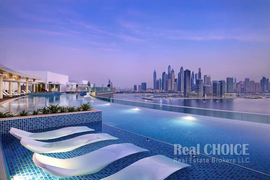 NH_Collection_Dubai_The_Palm_Pool View_Evening (1)-min. jpg
